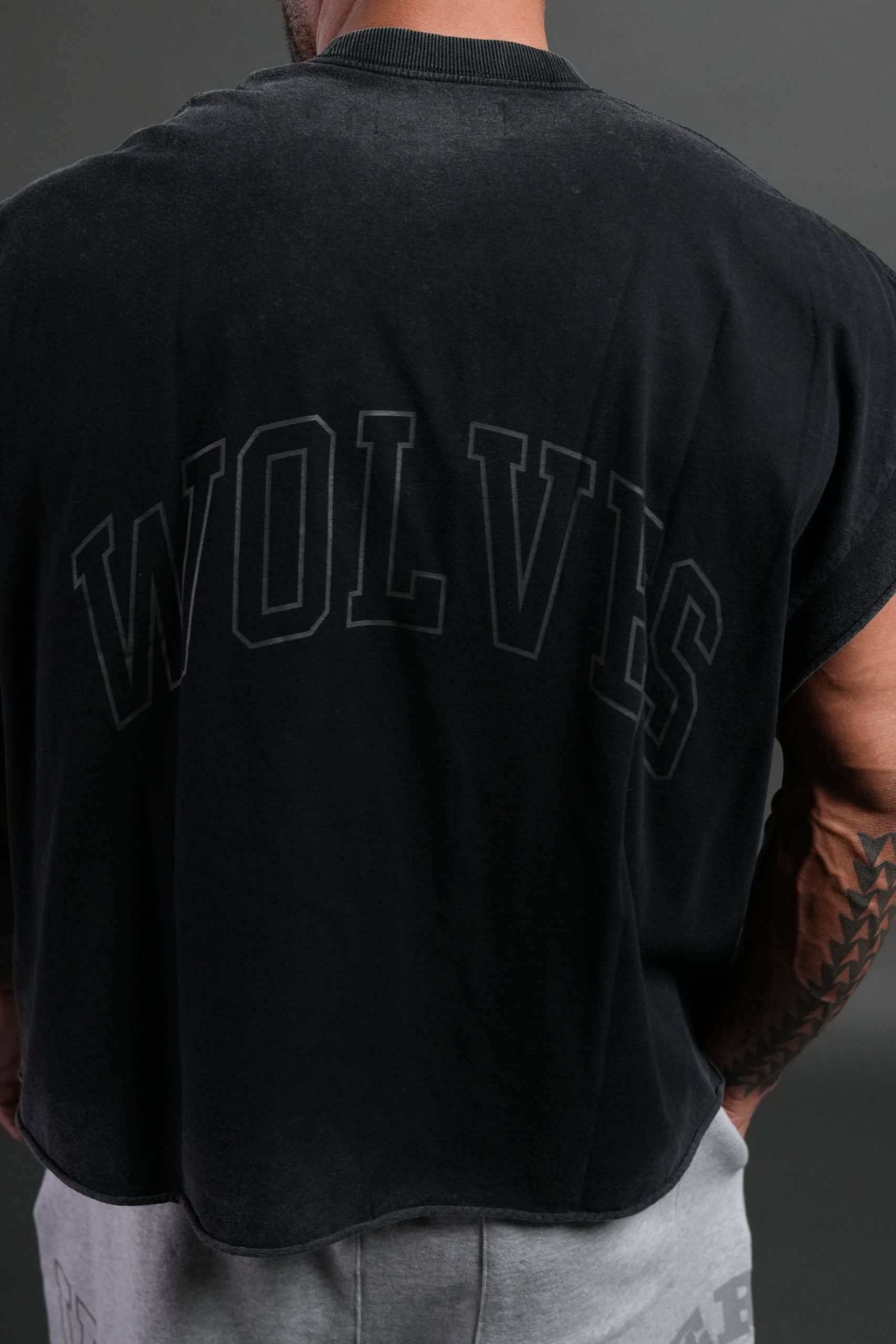 Powerhouse of the Wolves Grunge Cut-Off Tee in Black - Image 8