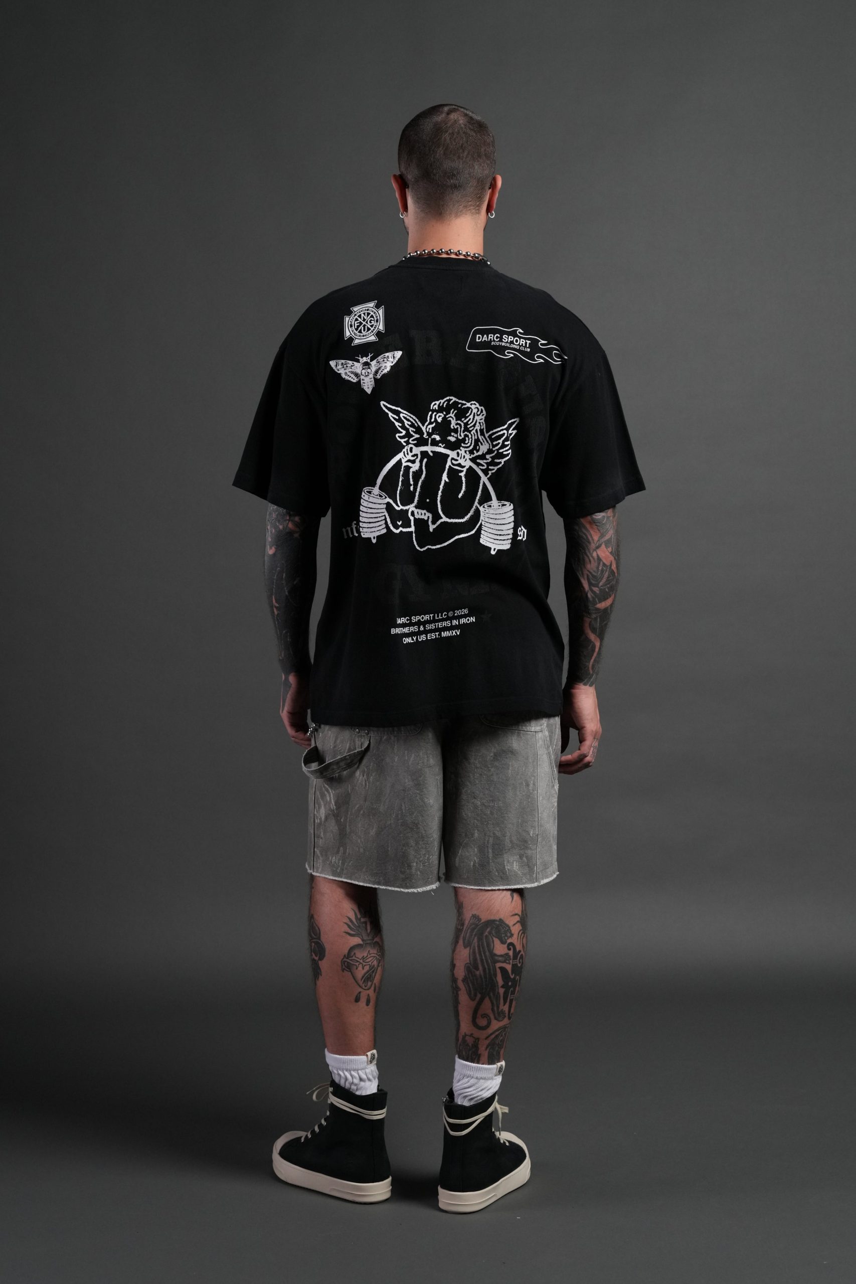 Powerhouse of the Cherub Unisex Premium Oversized Tee in Black Drift Wash - Image 6