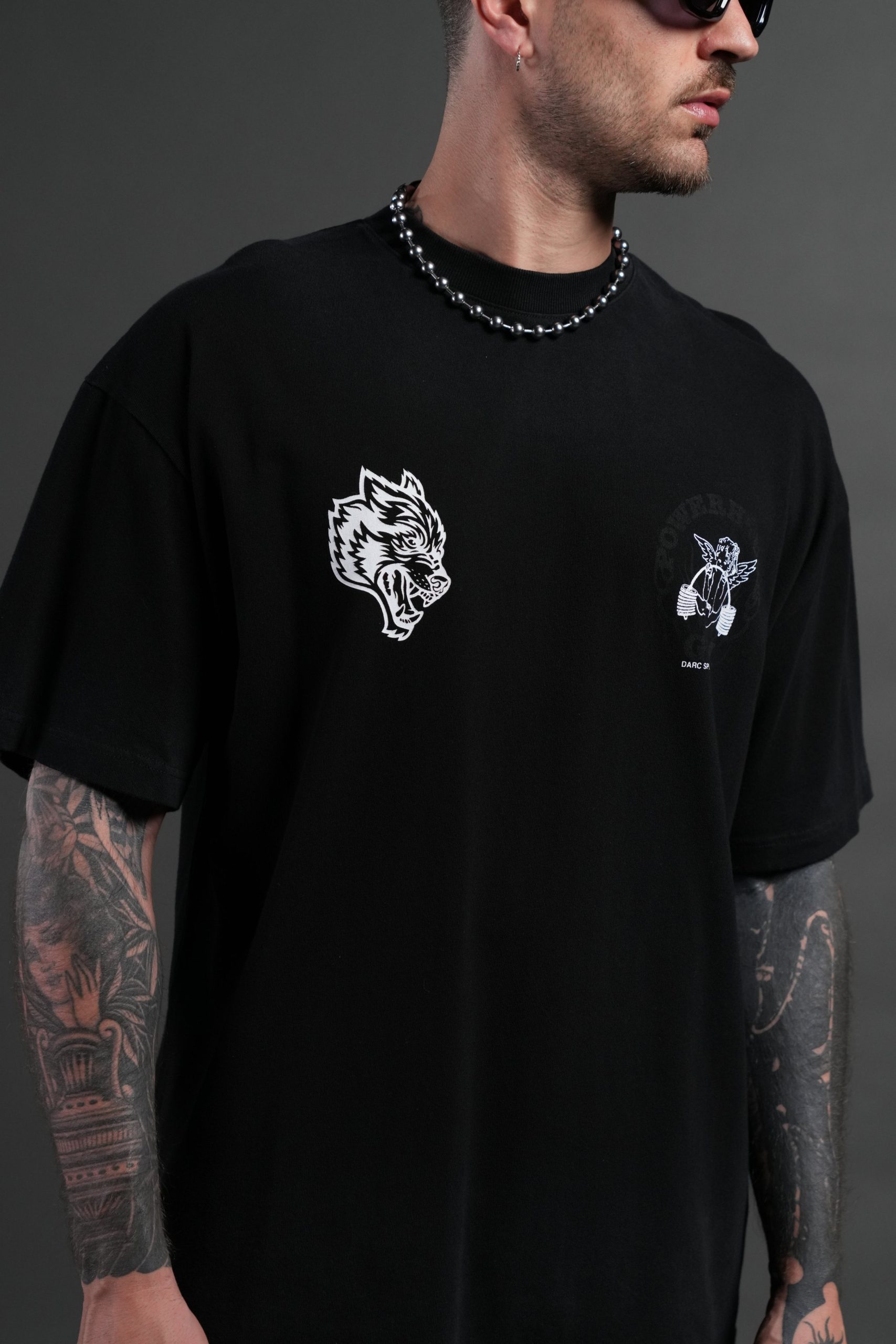 Powerhouse of the Cherub Unisex Premium Oversized Tee in Black Drift Wash - Image 7