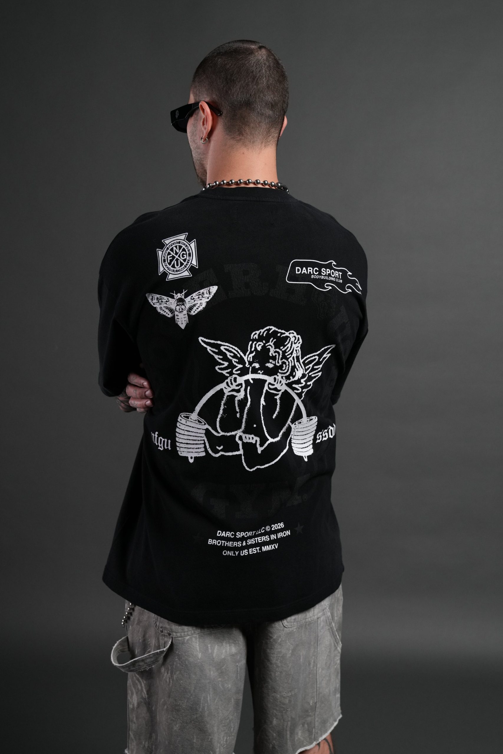 Powerhouse of the Cherub Unisex Premium Oversized Tee in Black Drift Wash - Image 4