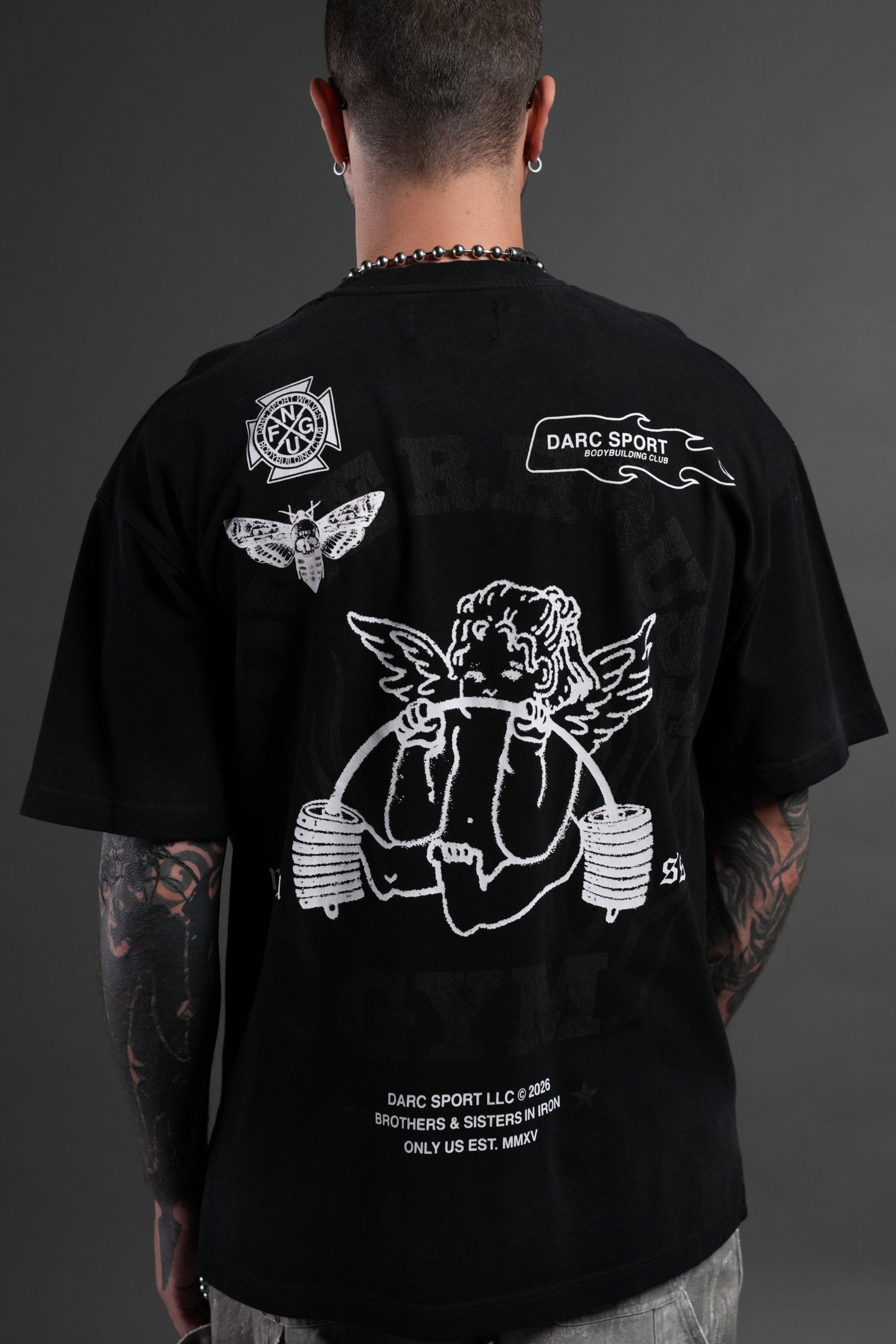 Powerhouse of the Cherub Unisex Premium Oversized Tee in Black Drift Wash - Image 8