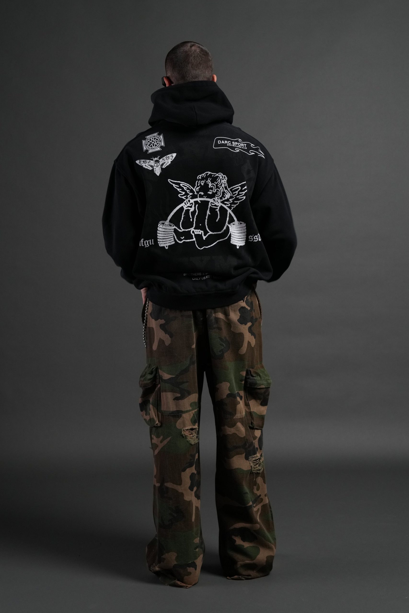Powerhouse of the Cherub Unisex Pierce Hoodie in Black Drift Wash - Image 6