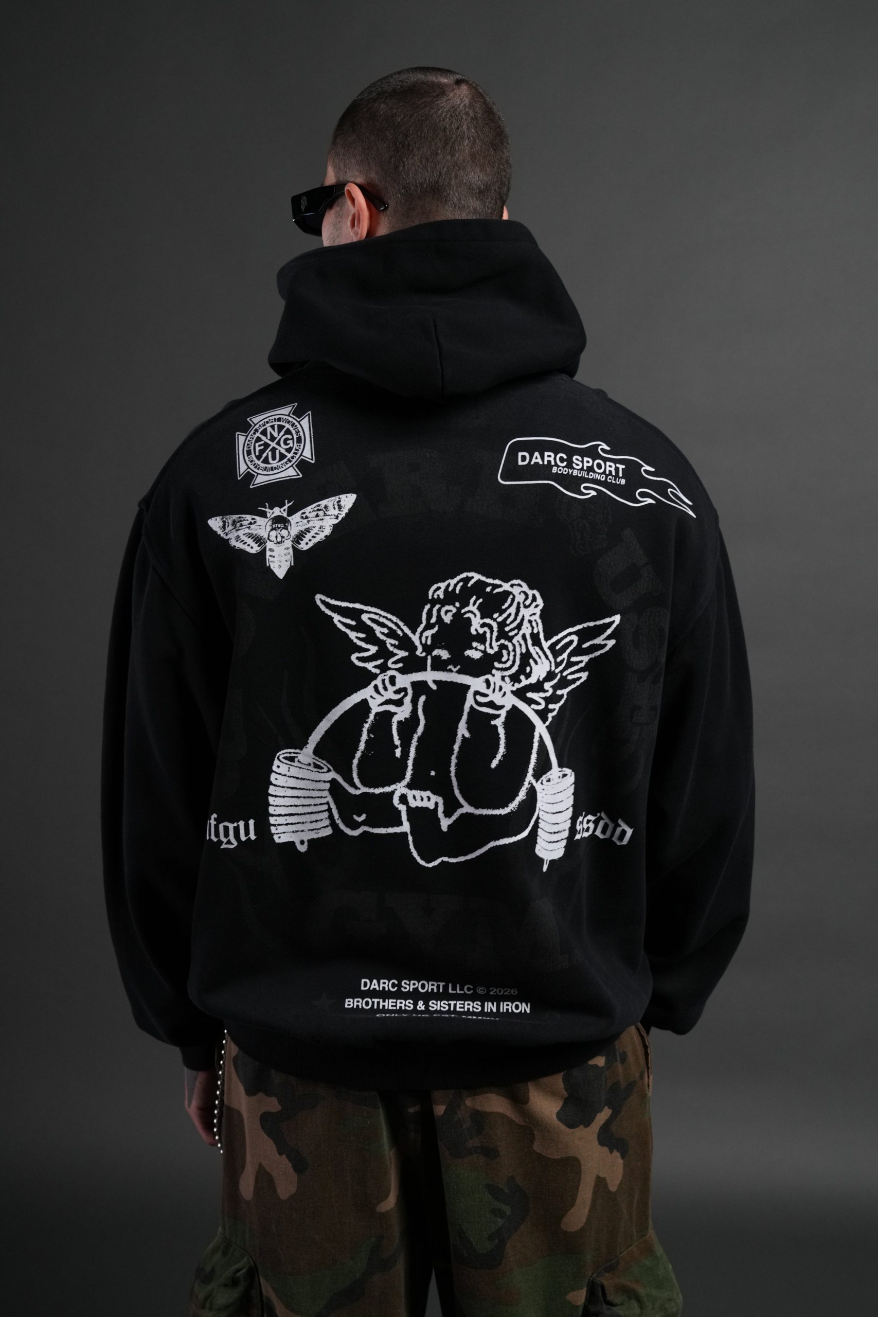 Powerhouse of the Cherub Unisex Pierce Hoodie in Black Drift Wash - Image 4