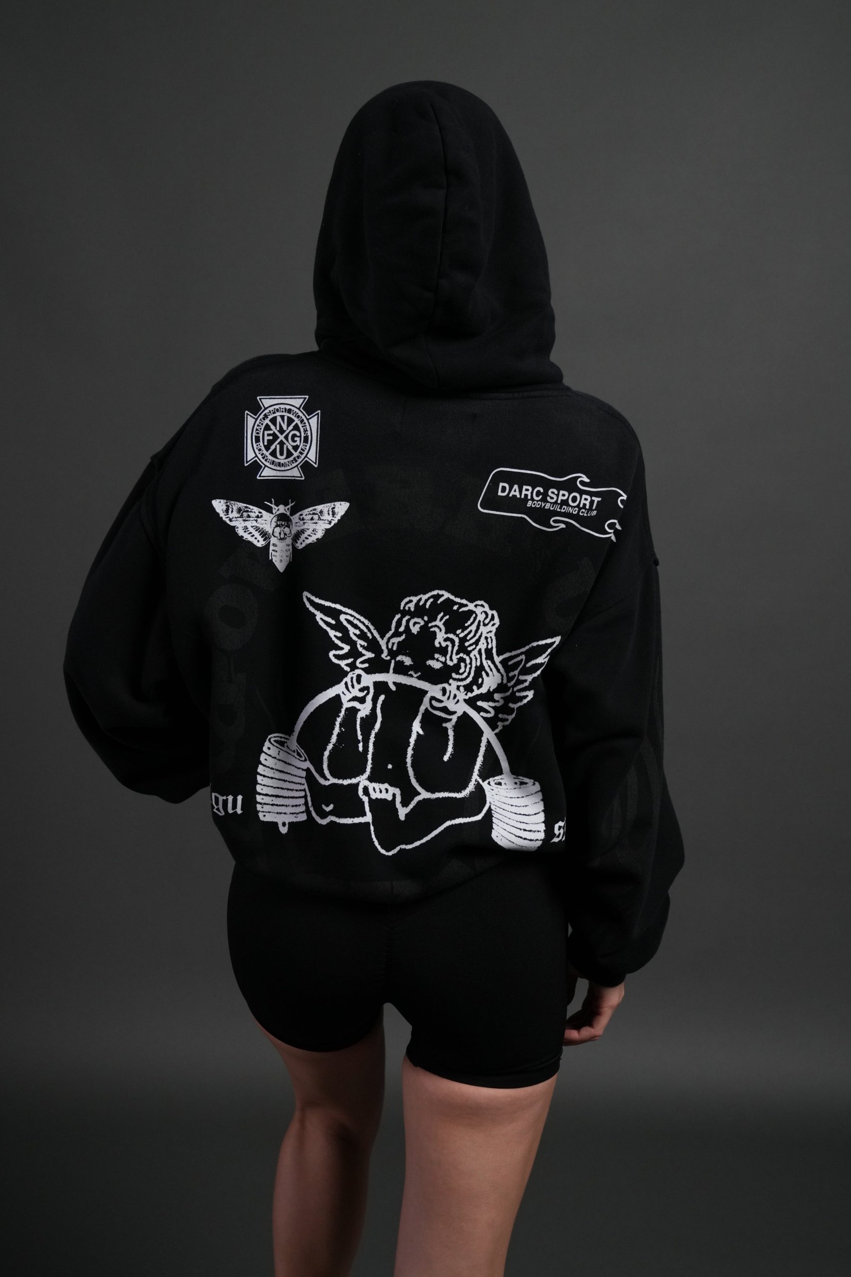 Powerhouse of the Cherub Unisex Pierce Hoodie in Black Drift Wash - Image 10