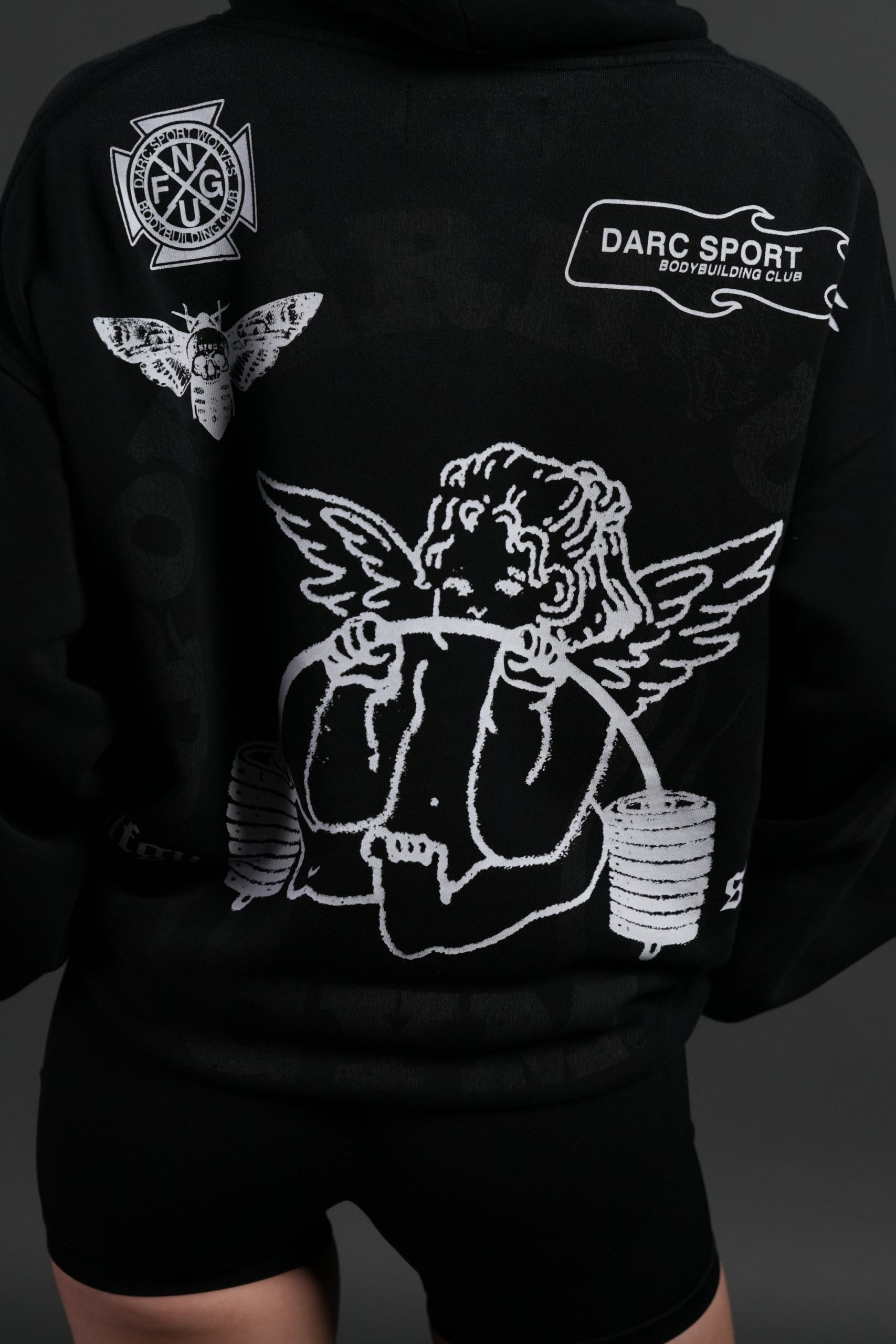 Powerhouse of the Cherub Unisex Pierce Hoodie in Black Drift Wash - Image 16