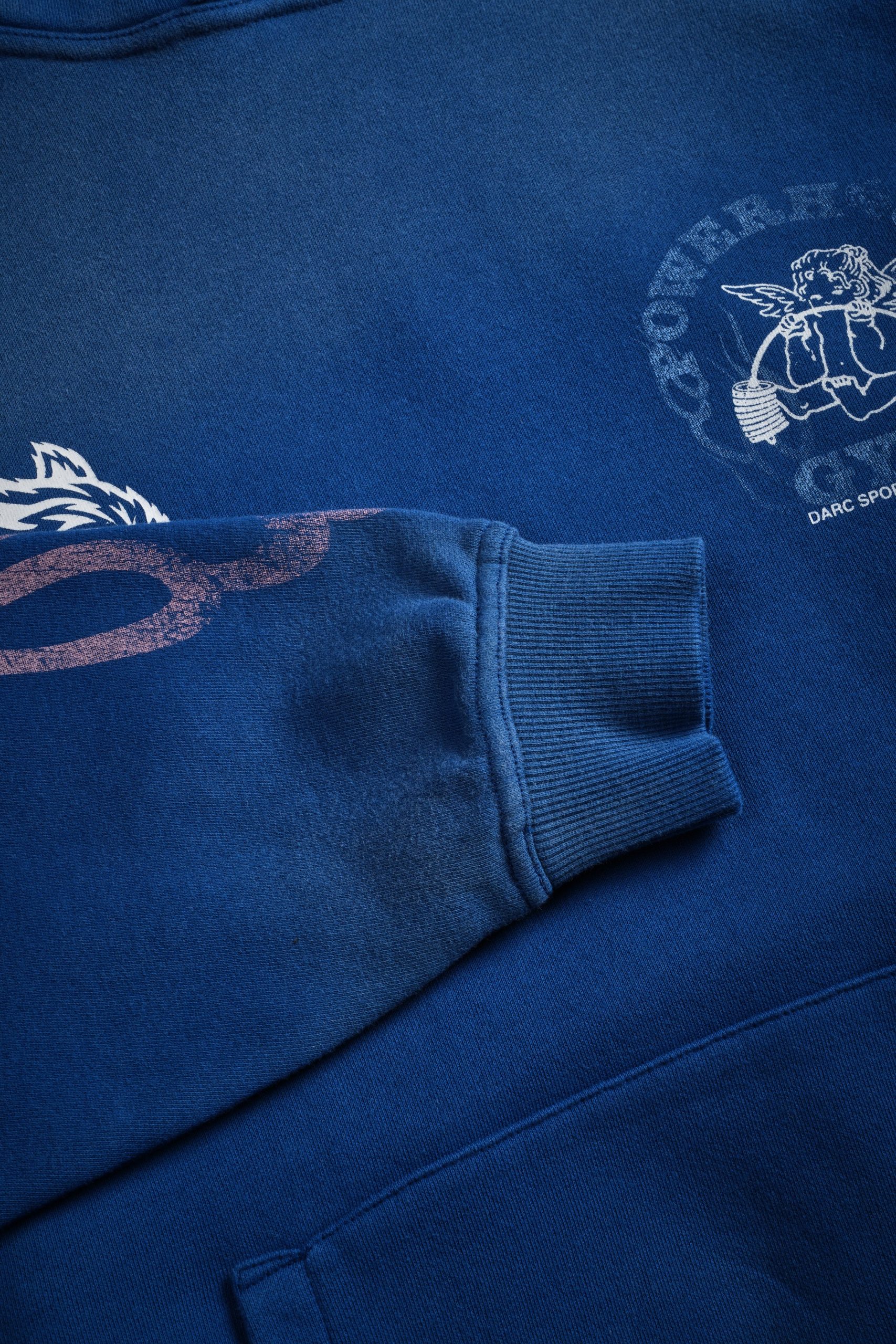 Powerhouse of the Cherub Unisex Pierce Hoodie in Darc Cobalt Drift Wash - Image 12