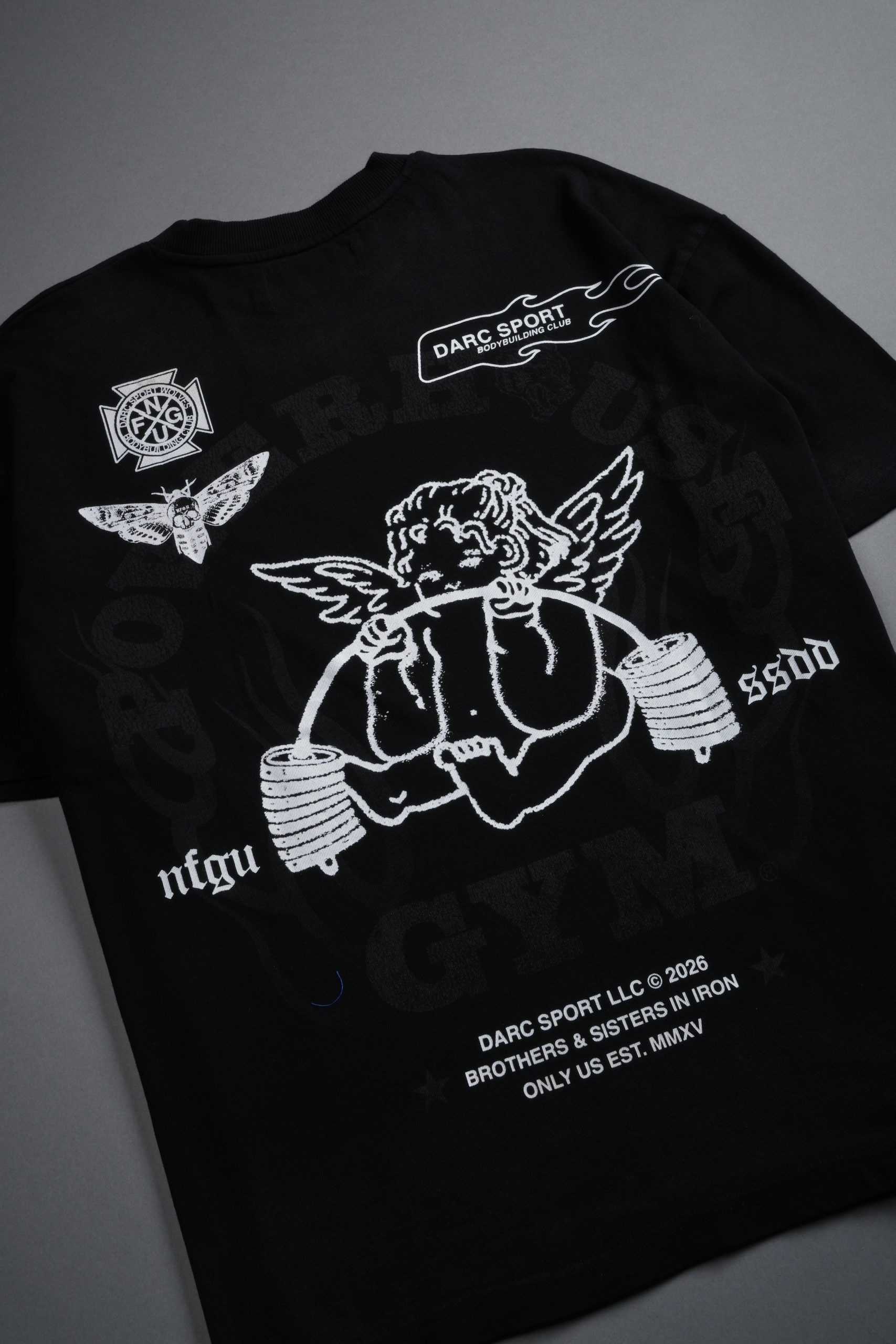 Powerhouse of the Cherub Unisex Premium Oversized Tee in Black Drift Wash - Image 10