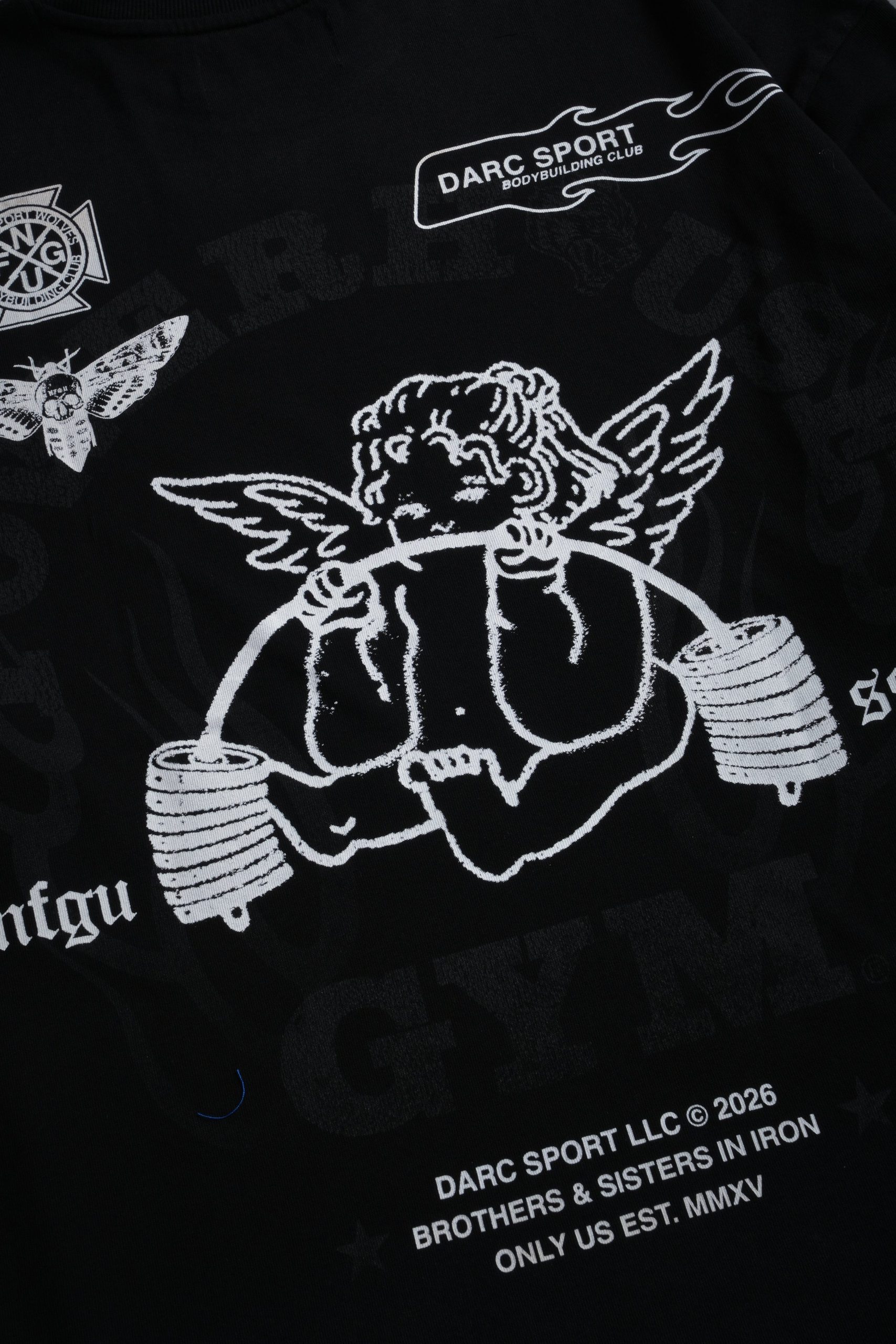 Powerhouse of the Cherub Unisex Premium Oversized Tee in Black Drift Wash - Image 11